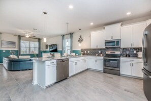 House, Multiple Beds | Private kitchen