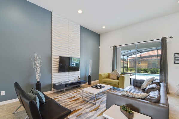 House, 5 Bedrooms | Living area | Flat-screen TV