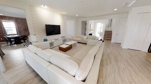 House, Multiple Beds | Living area | Flat-screen TV