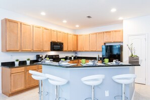 House, Multiple Beds | Private kitchen