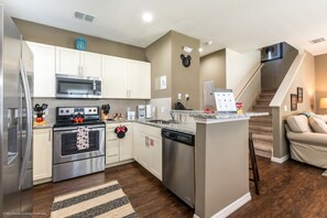 Townhome, 4 Bedrooms | Living area | Flat-screen TV