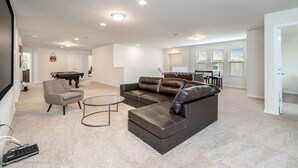 Casa, varias camas | Área de sala de estar