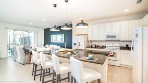 Casa, varias camas | Cocina privada