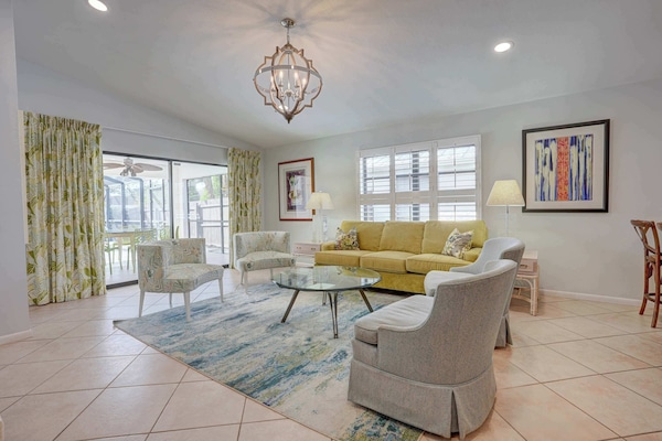 Spacious Living Room with access to Pool Area!