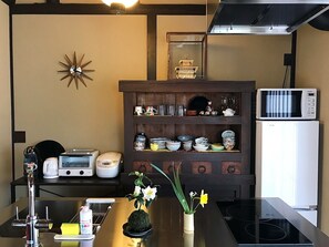 Fridge, microwave, stovetop, coffee/tea maker