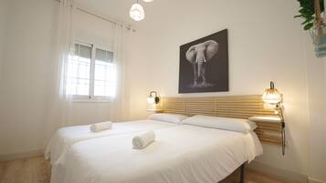 2 dormitorios, tabla de planchar con plancha, wifi gratis y ropa de cama