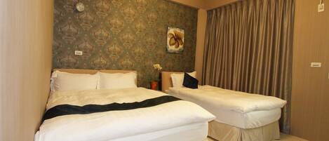 Desk, blackout curtains, free WiFi, bed sheets