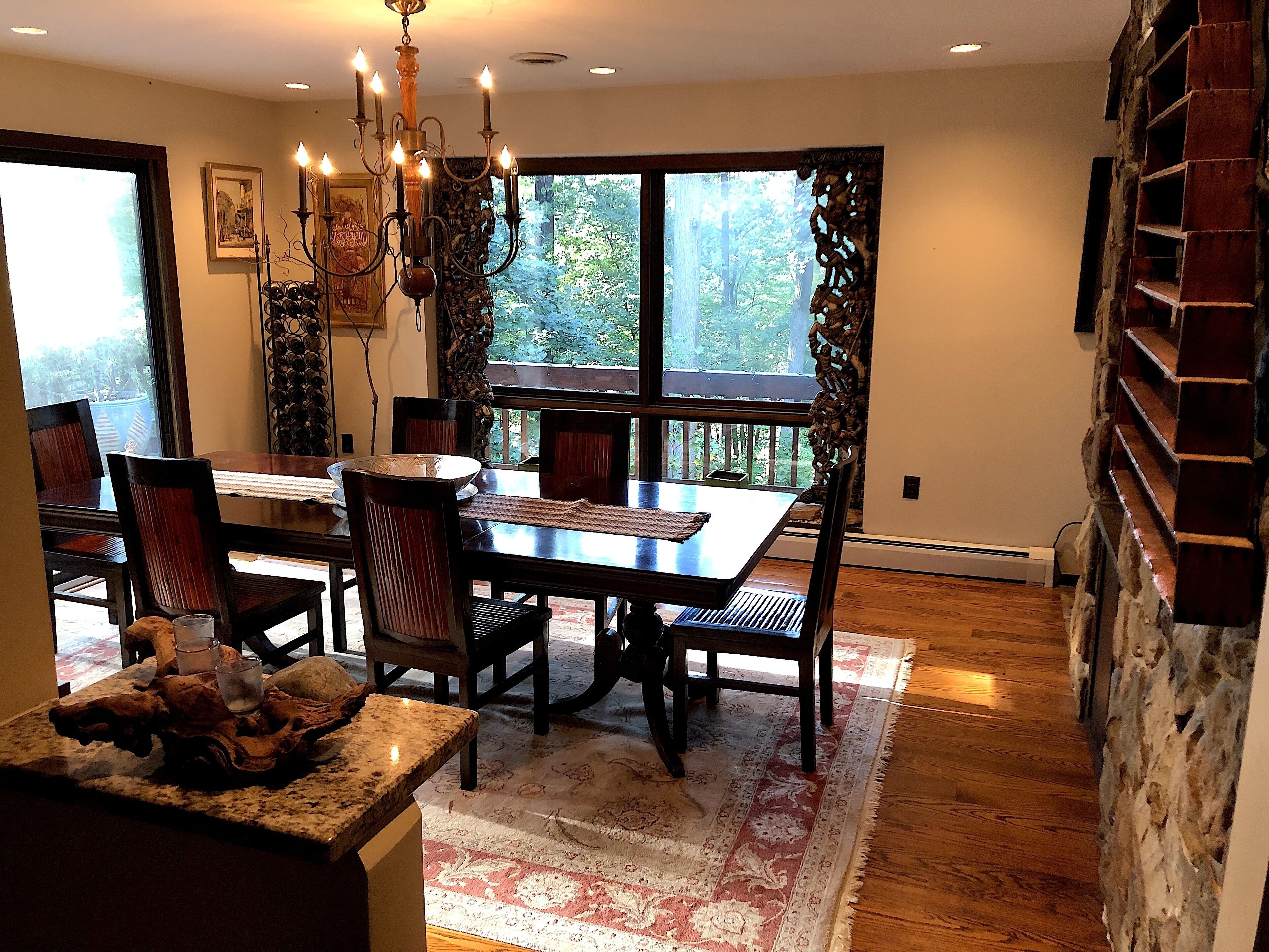 The elegant, yet informal dining room with great views of the forest