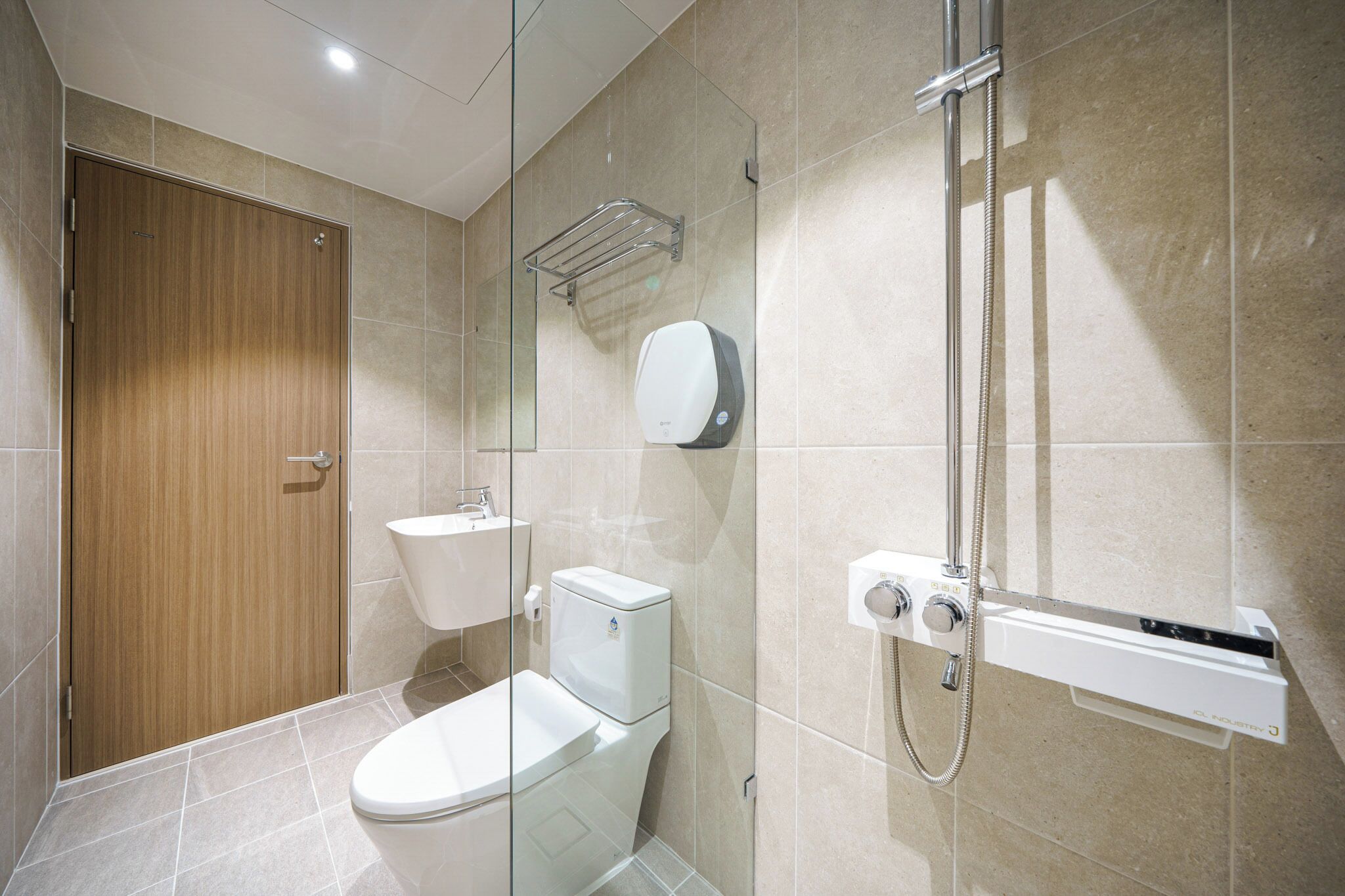 shower, designer toiletries, hair dryer, towels