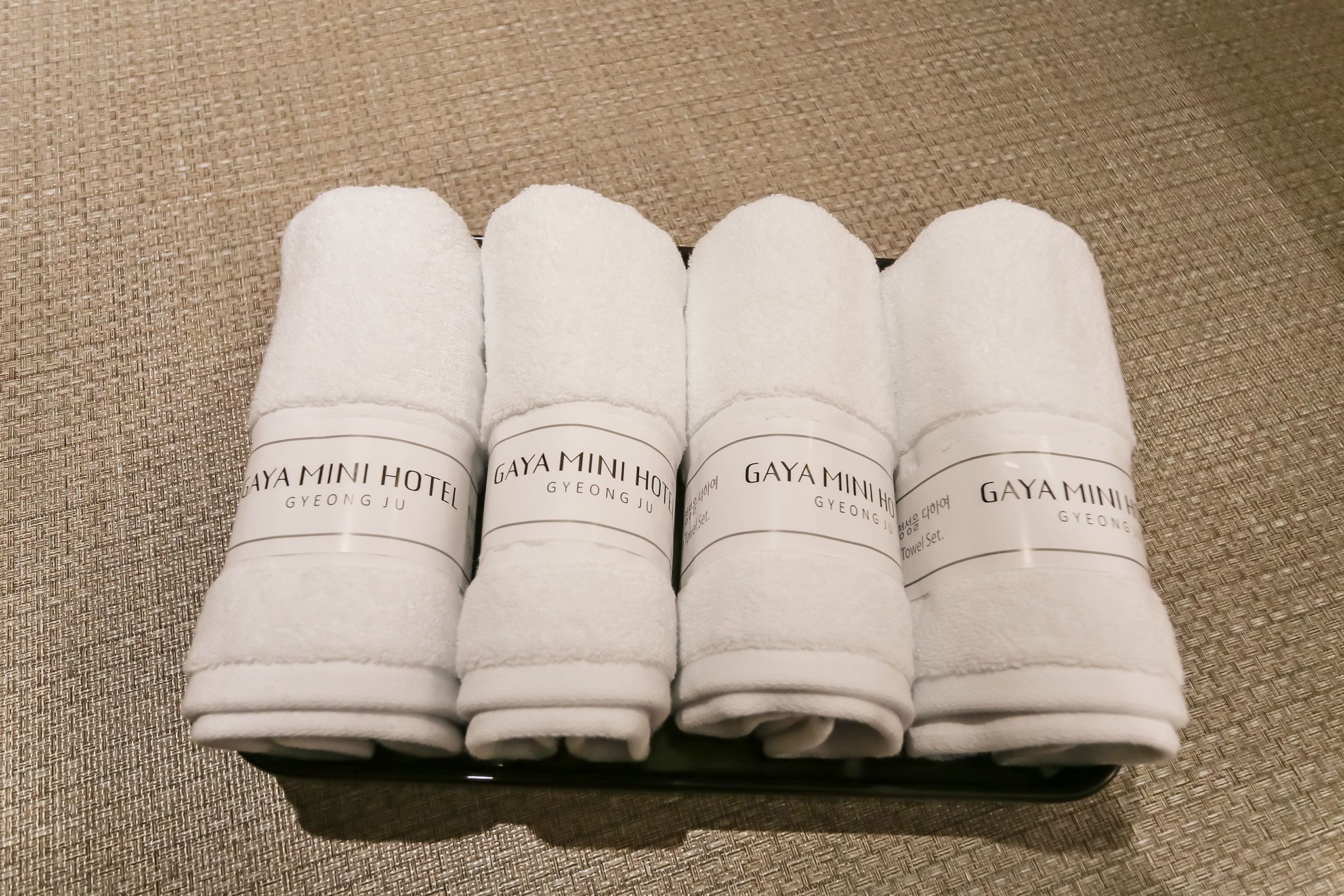 shower, designer toiletries, hair dryer, towels