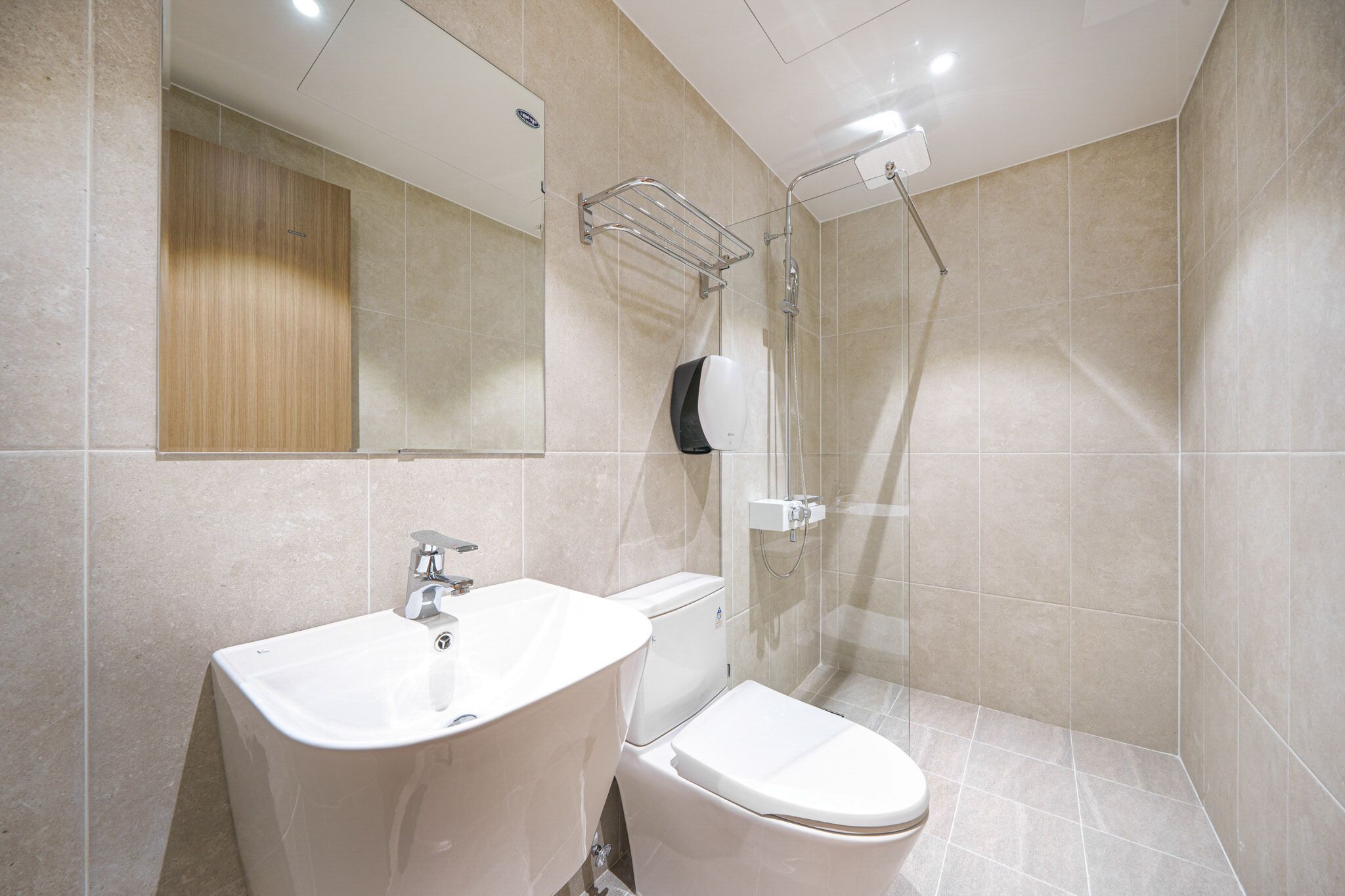 shower, designer toiletries, hair dryer, towels