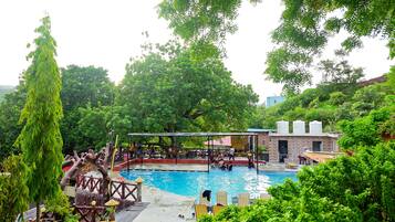 2 outdoor pools, pool umbrellas, pool loungers