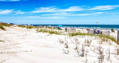 Oceanfront with easy beach access, large pool, and tiki bar/restaurant!