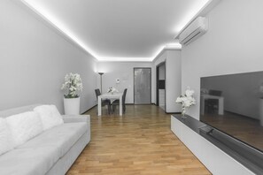 Lejlighed - køkken - byudsigt (Le Scale) | Opholdsområde | LED-tv