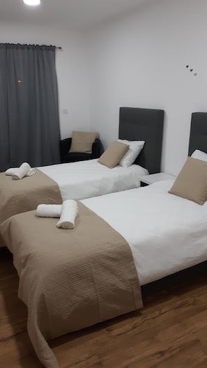 9 habitaciones, tabla de planchar con plancha, wifi y ropa de cama