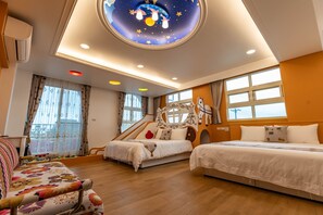 A hotel room with a large bed, a smaller bed, a sofa, and a ceiling with a starry design. - Honeysuckle Family Castle (Wujie)