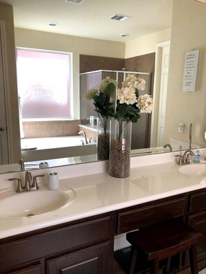Jetted bath, hair dryer, towels, soap