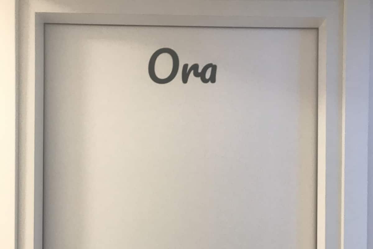 A door with the name "Ora" on it.