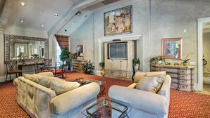A spacious living room with high ceilings, a large TV, and comfortable seating. - "Scottsdale Gem Near Pickleball Courts & Park!" (Scottsdale)
