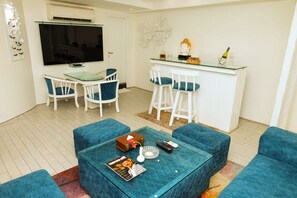 Minibar, desk, laptop workspace, blackout curtains