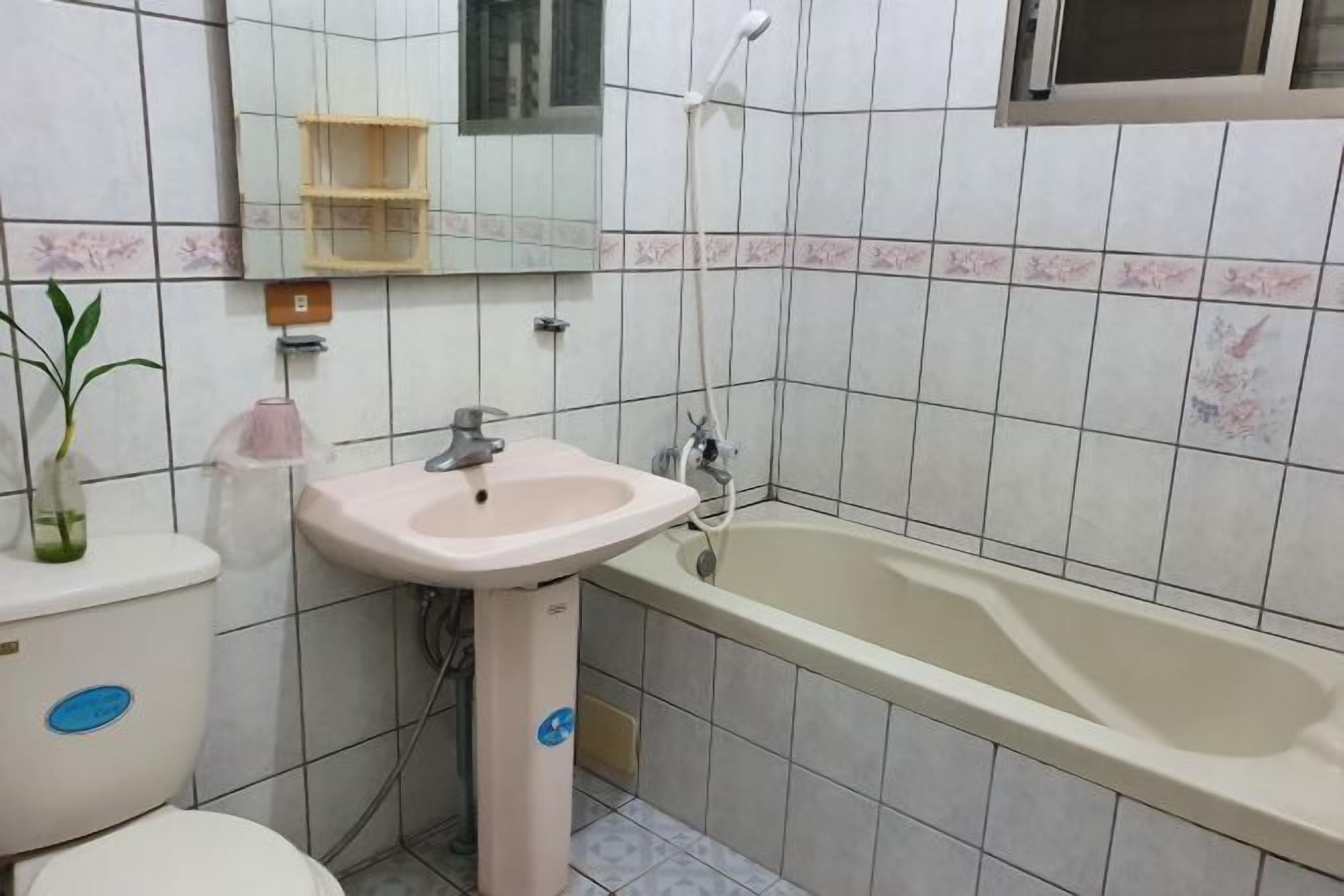 Shower, free toiletries, hair dryer, slippers