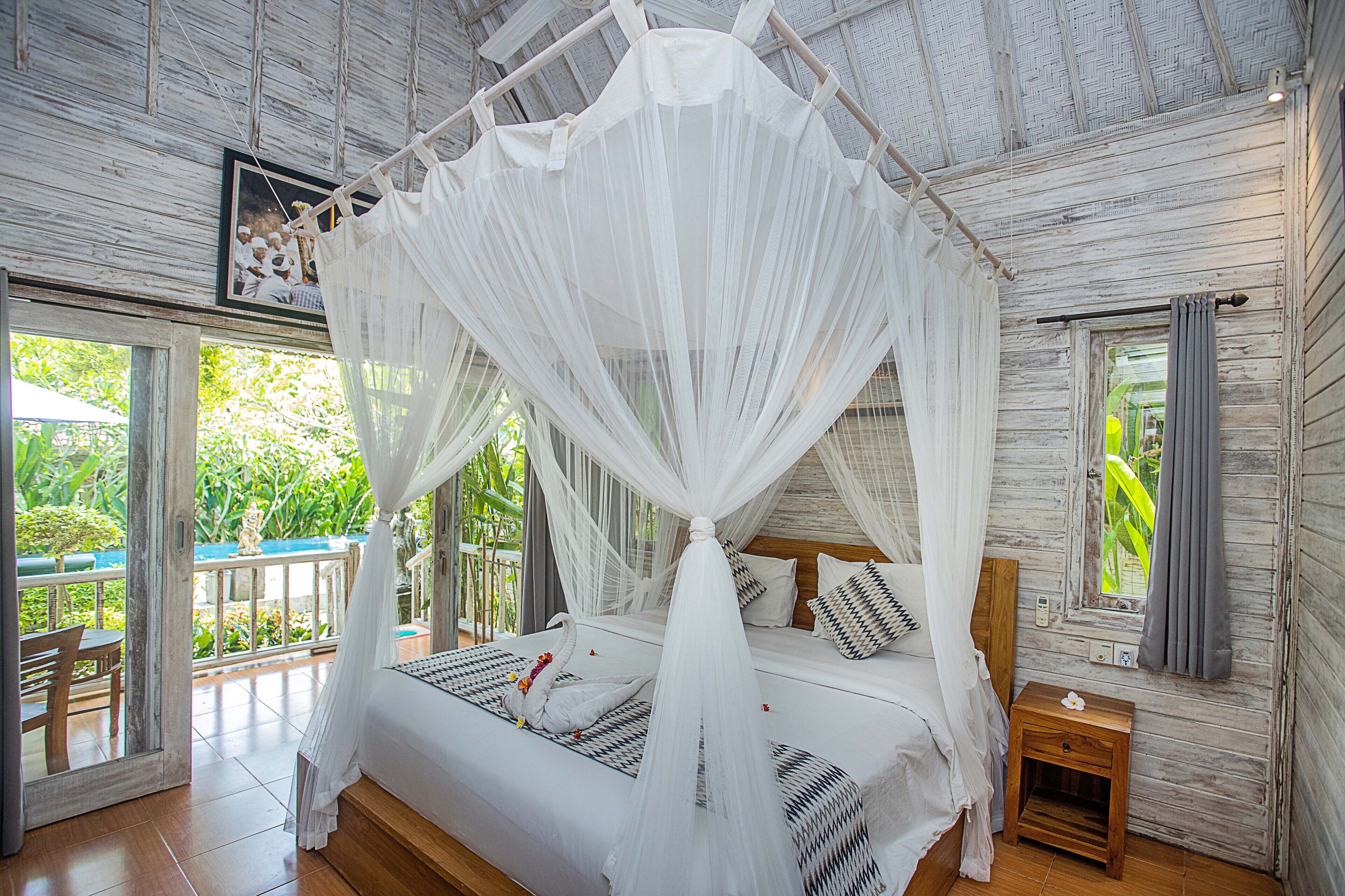 디럭스 더블룸 | 미니바, 책상, 암막 커튼, 간이 침대