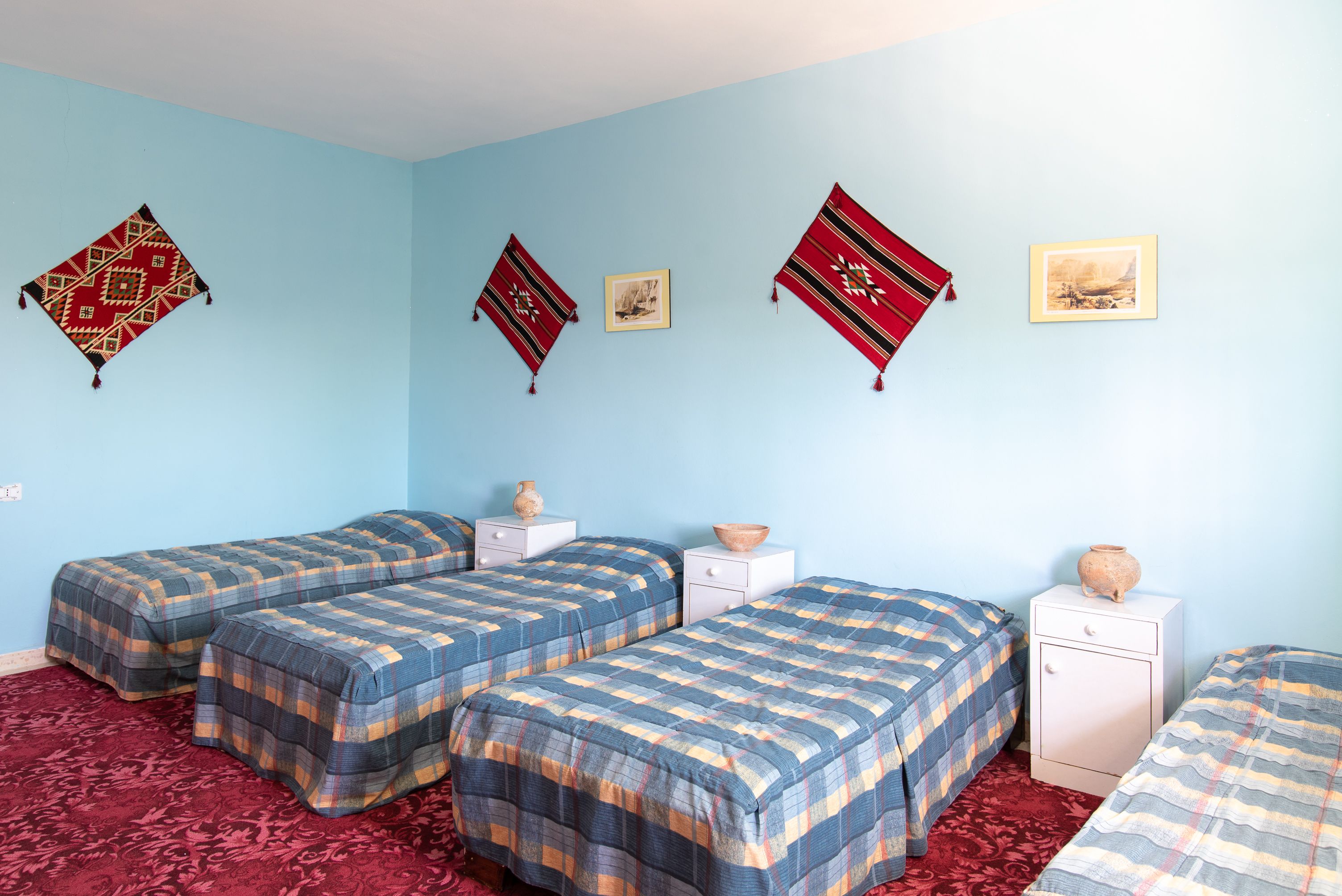 Habitación cuádruple | Camas supletorias, wifi gratis, ropa de cama