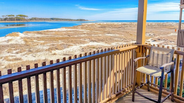 A wooden deck with a view of a beach and ocean. - Inlet Point Villas #4C! Relax & Recharge in Cherry Grove’s Most Peaceful Corner (North Myrtle Beach)