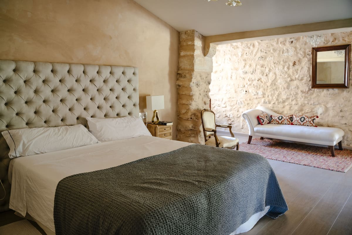 Suite, Terraza | 1 habitación, ropa de cama de alta calidad, edredón y minibar