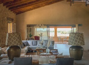 Luxury Villa | Living room | 50-cm flat-screen TV with cable channels