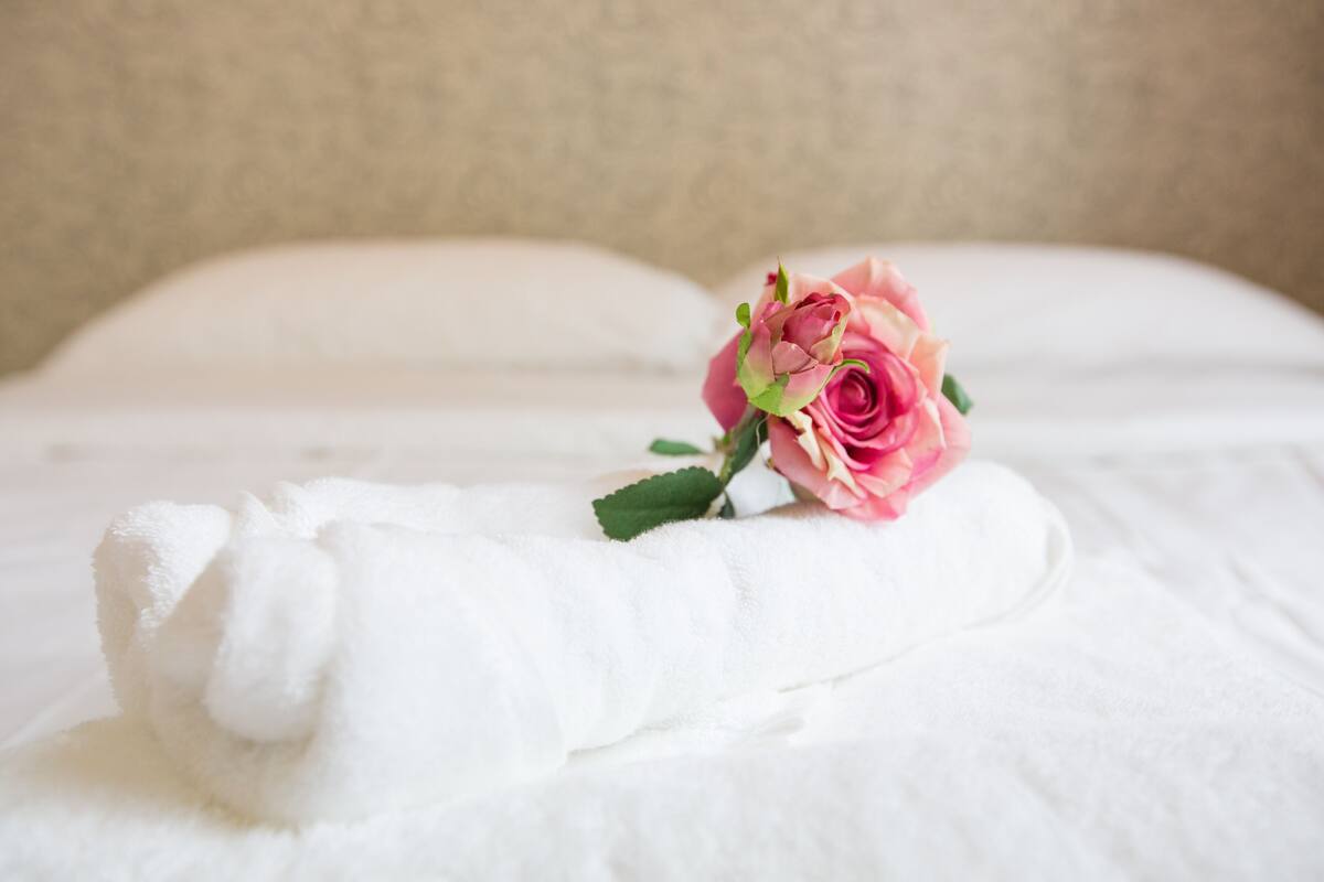 1 bedroom, premium bedding, blackout curtains, rollaway beds