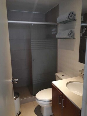 Hair dryer, towels, soap, shampoo