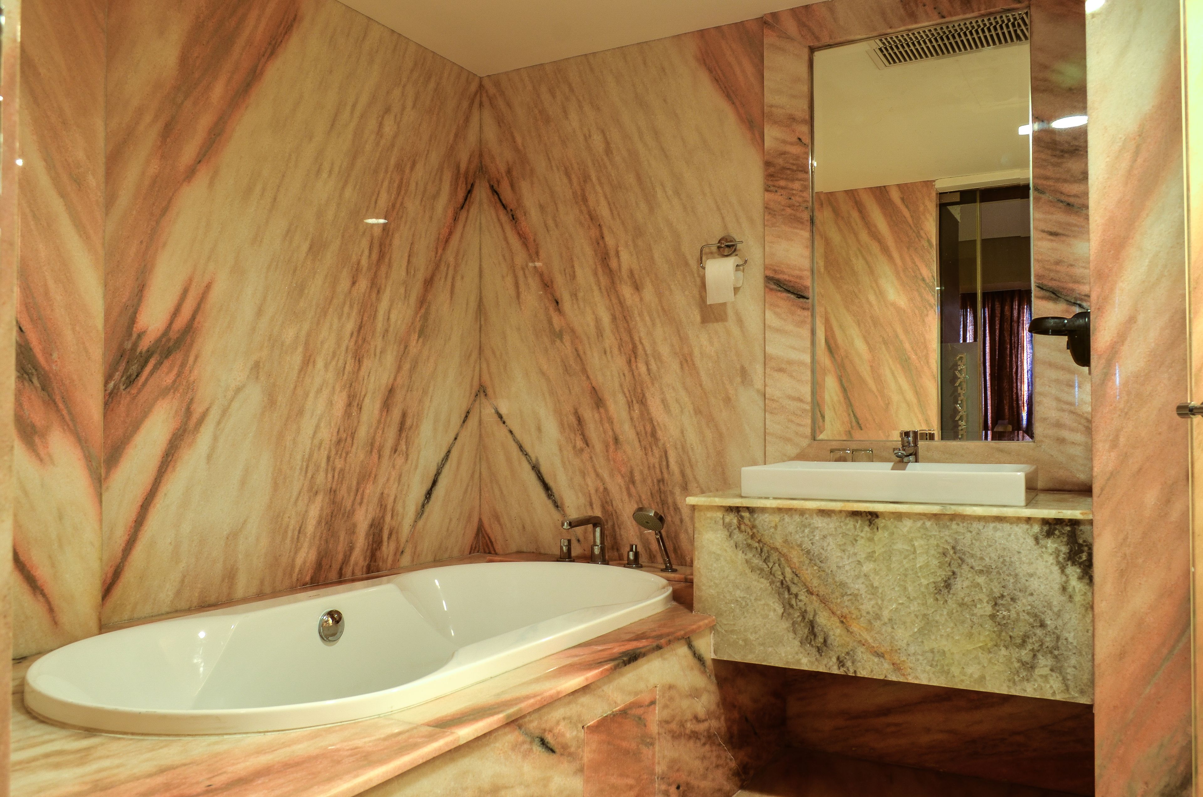 business suite | bathroom | slippers, towels, soap, shampoo