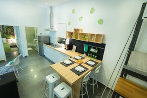 Apartment (Elevated Lounge Area) | Private kitchen | Fridge, stovetop, coffee/tea maker, cookware/dishes/utensils - Apartments Galleria Chill (Rijeka)
