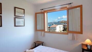 2 dormitorios, tabla de planchar con plancha, Internet y ropa de cama