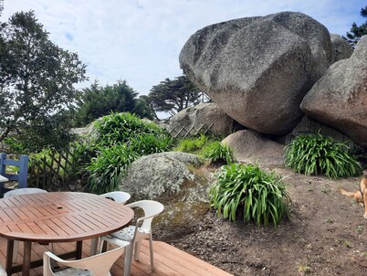 Fisherman's cottage nestled in the rocks of Trégastel, Pink Granite Coast