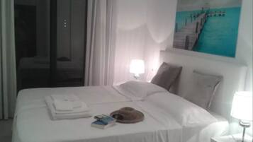 2 dormitorios, tabla de planchar con plancha, wifi gratis y ropa de cama