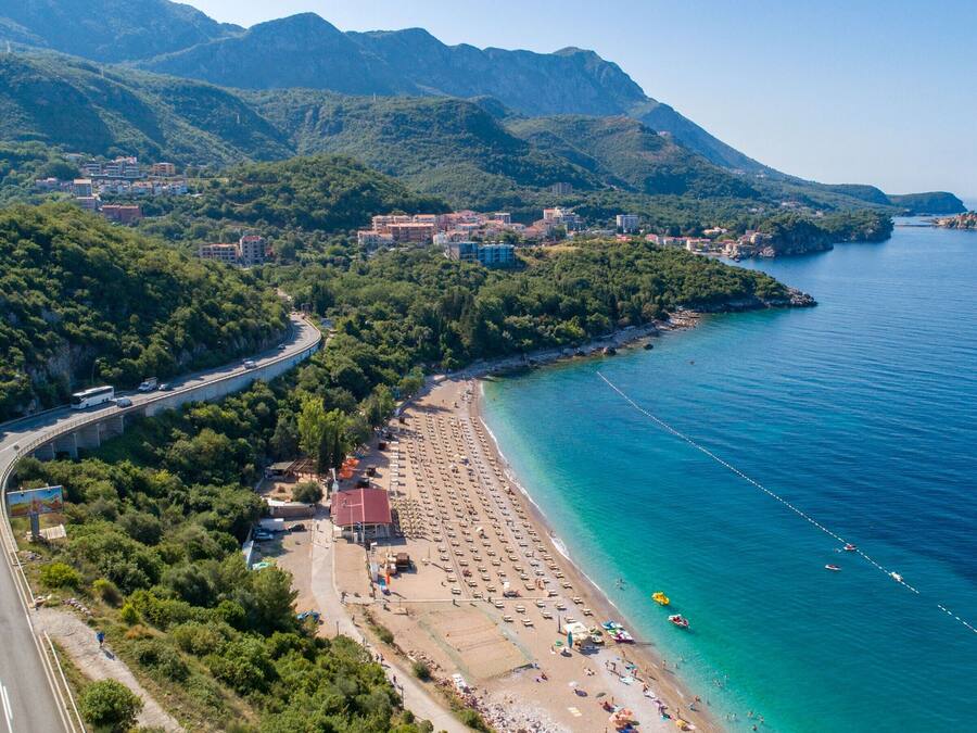 Beach nearby, white sand, sun loungers, beach umbrellas