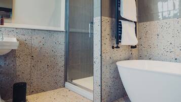 Family Quadruple Room | Bathroom | Shower, free toiletries, hair dryer, bathrobes