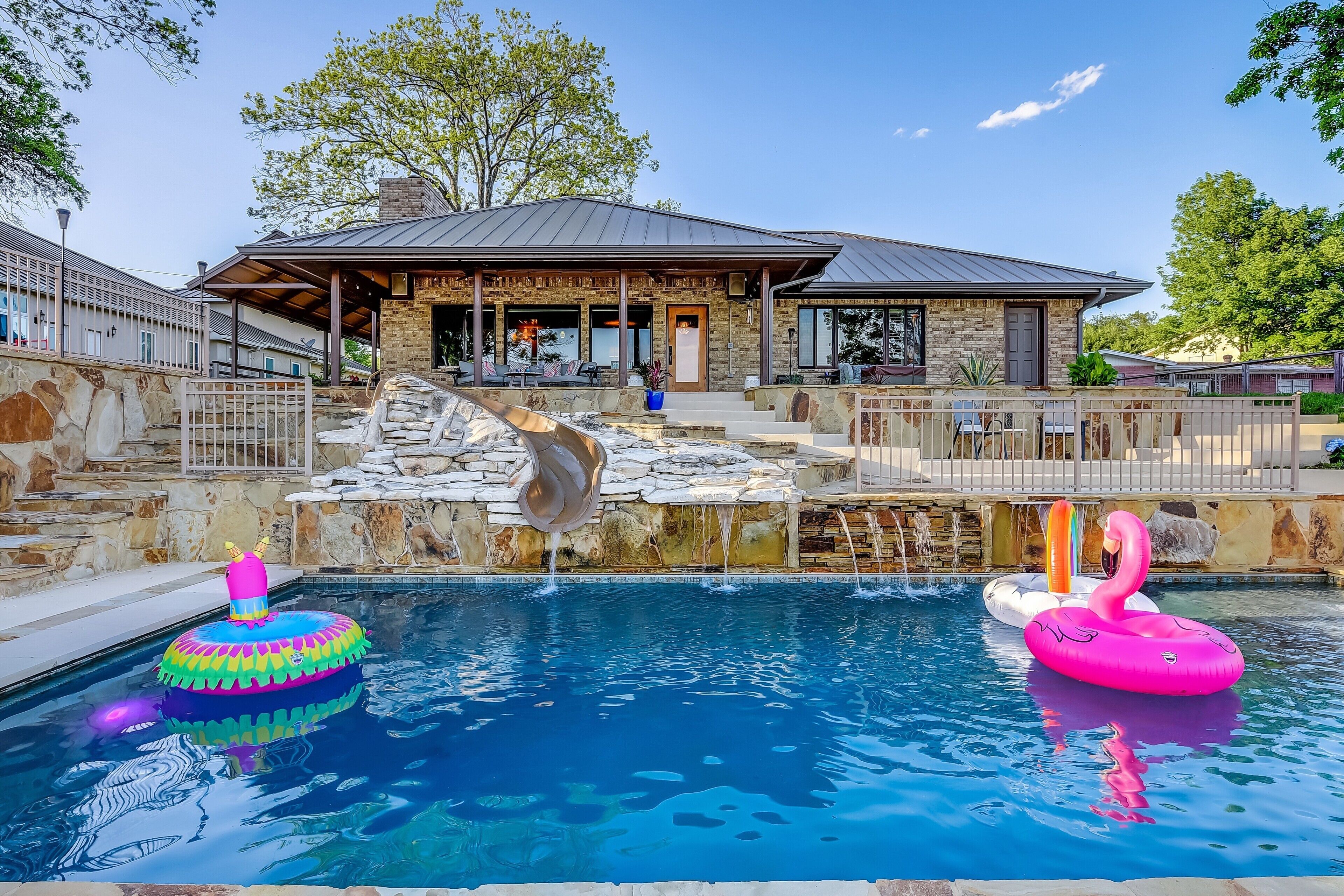 WATERFRONT HOME WITH**2 POOLS,WATERSLIDE, &HUGE BOAT DOCK & LAY OUT AREA! FUN!<br>