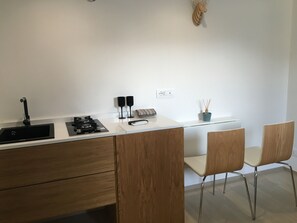 Fridge, stovetop, coffee/tea maker, toaster