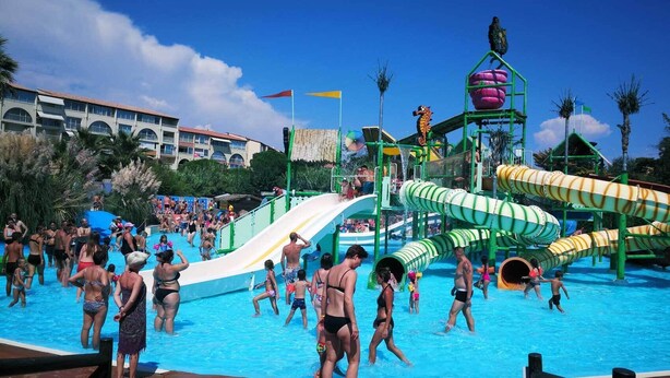 A water park with multiple slides and pools. - Sea view, beach and port 2m away on foot, private parking  (Agde)