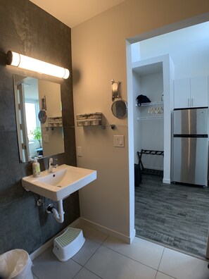Apartment, 1 Queen Bed | Bathroom | Shower, free toiletries, hair dryer, towels