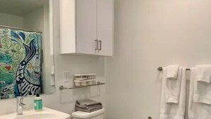 Business Studio, 1 Queen Bed | Bathroom | Shower, free toiletries, hair dryer, towels - Prime Roosevelt Contemporary Studio (Seattle)