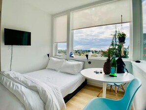 Business Studio, 1 Queen Bed | Individually decorated, individually furnished, desk, laptop workspace - Prime Roosevelt Contemporary Studio (Seattle)