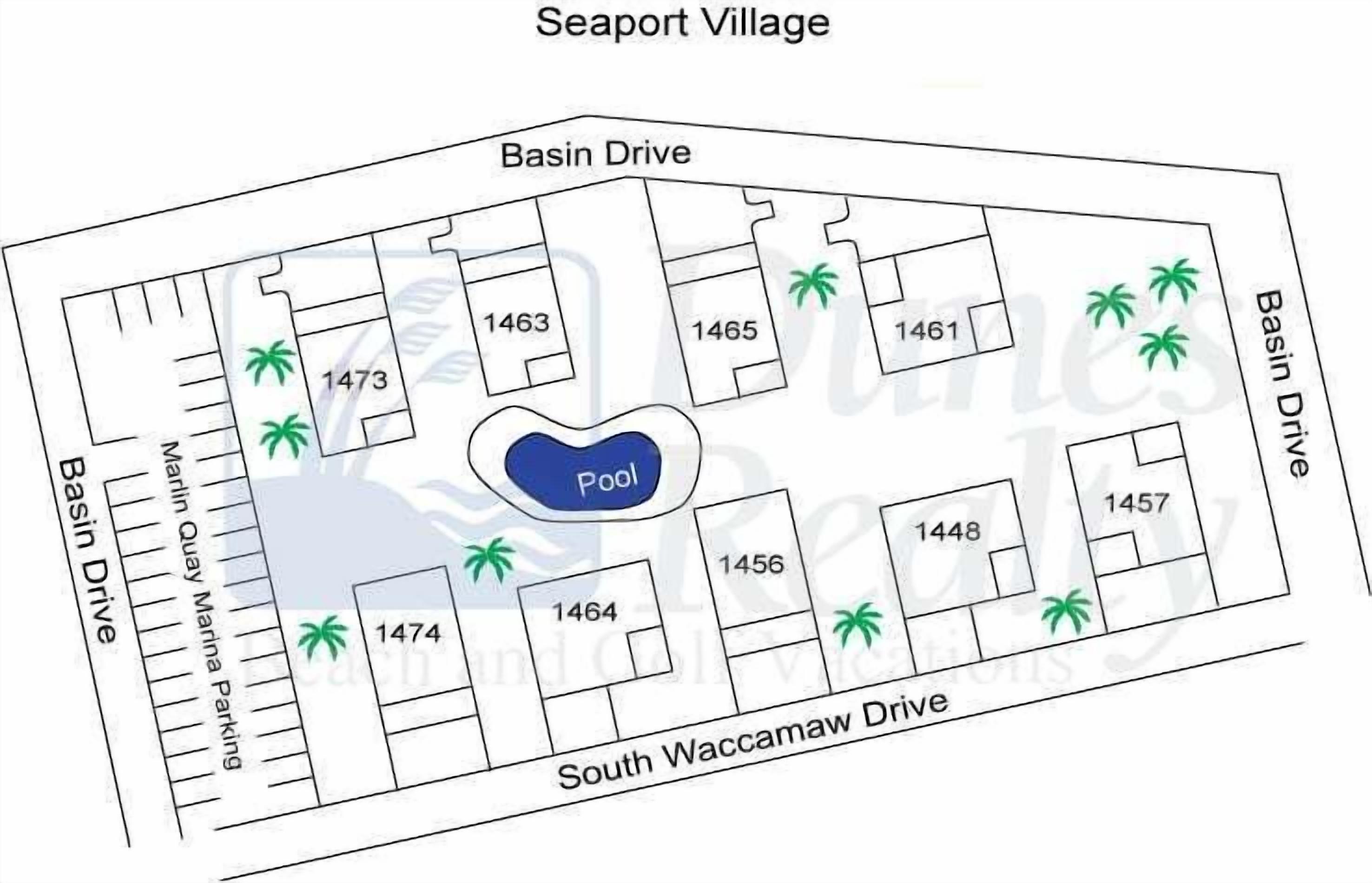 A layout of Seaport Village with numbered villas, a pool, and palm trees.