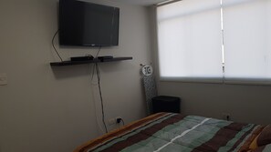 1 habitación, tabla de planchar con plancha, wifi y ropa de cama 