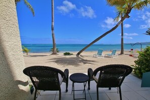 On the beach, sun-loungers, beach towels - Oceanfront, Beachfront, Ground Floor, Beautiful Remodeled condo with pool access (Christiansted)