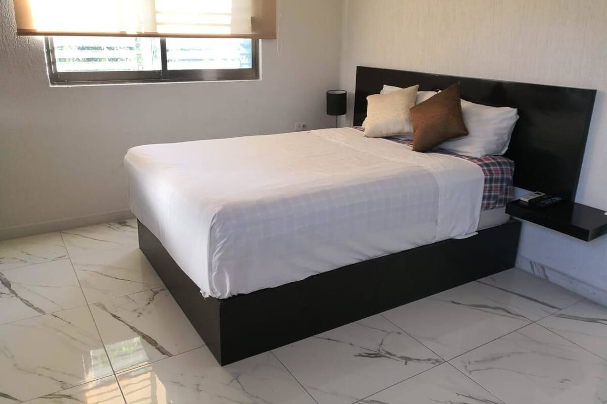 Apartment, 1 King Bed, Non Smoking | Blackout curtains, free WiFi, individually decorated