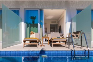 Swim up Room Double or Twin inland view | Minibar, in-room safe, laptop workspace, blackout drapes